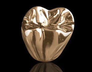 Gold crowns in Midtown Manhattan and Downtown Brooklyn, NY